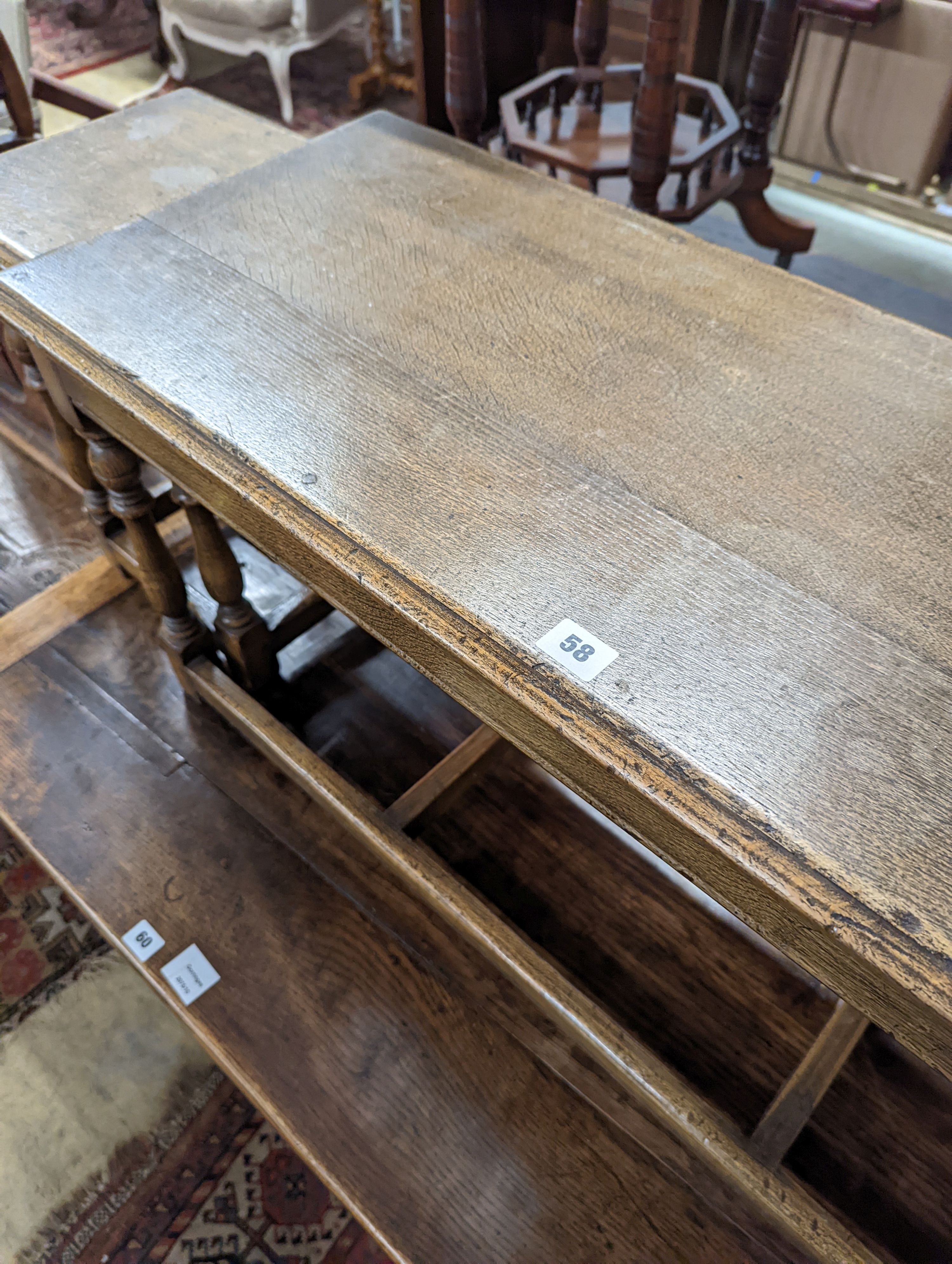 A nest of 18th century oak occasional tables, width 101cm, depth 38cm, height 46cm